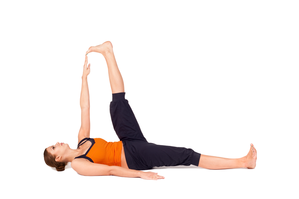 Woman practicing a hamstring stretch