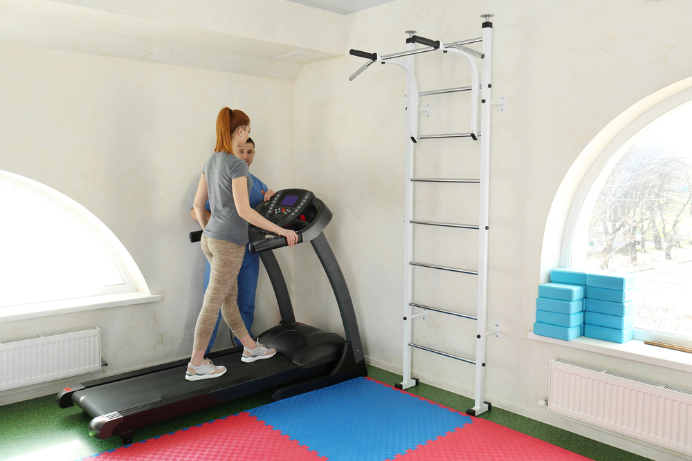 Patient exercising under physiotherapist supervision